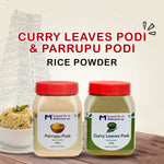 Two jars of Curry Leaves Podi and Parrupu Podi with a bowl of rice in the background.